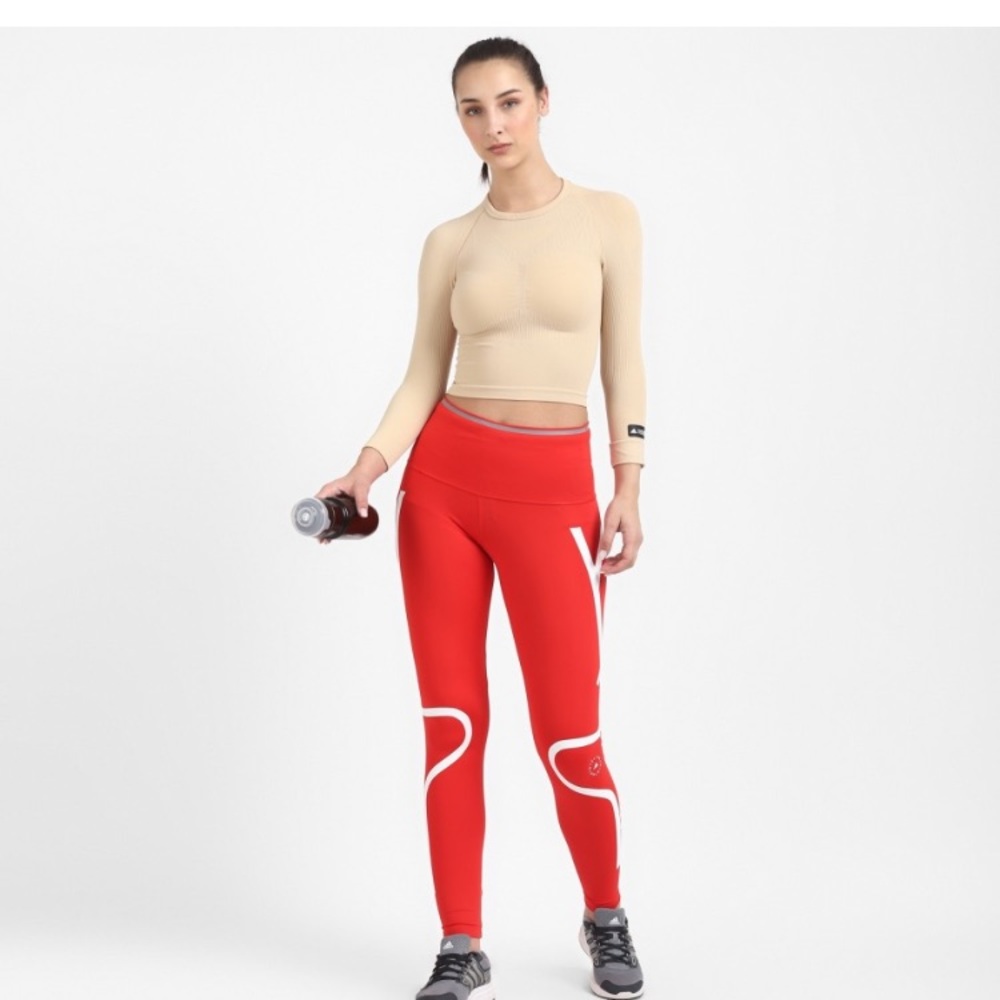ADIDAS
Women Solid Round Neck Beige T-Shirt - Picture 6 of 9